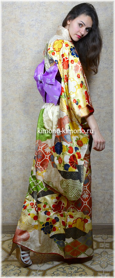 японское кимоно и пояс оби, завязанный  в виде бабочки